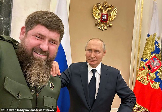 Vladimir Putin, 72, kanan, dan Ramzan Kadyrov, 48, kiri, diberikan penghargaan 'Untuk Pelayanan kepada Tanah Air' dalam upacara Kremlin yang tidak diumumkan namun difilmkan secara diam-diam.