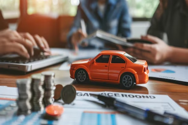 Berapa cicilan bulanan jika saya mengambil pinjaman mobil sebesar INR 10,00,000 dari Canara Bank selama 7 tahun?