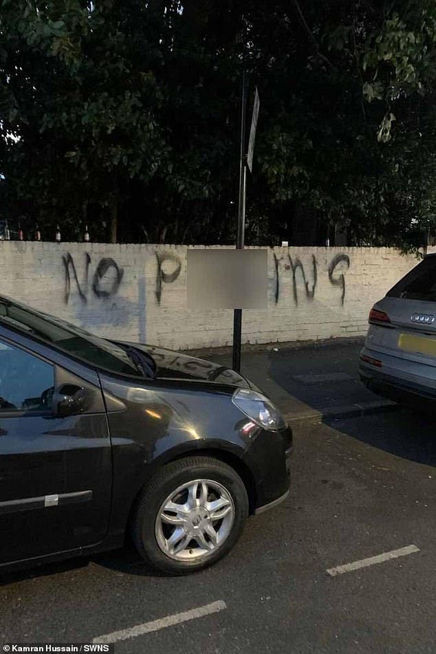 Grafiti di dinding jalan tempat tinggal Kamran di London - dia berharap bisa membawa seluruh keluarganya ke Dubai setelah dia menetap