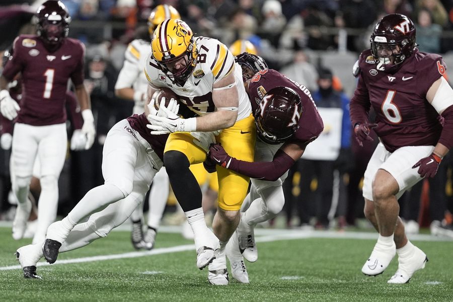 Sepak Bola NCAA: Duke Mayo Bowl-Minnesota di Virginia Tech